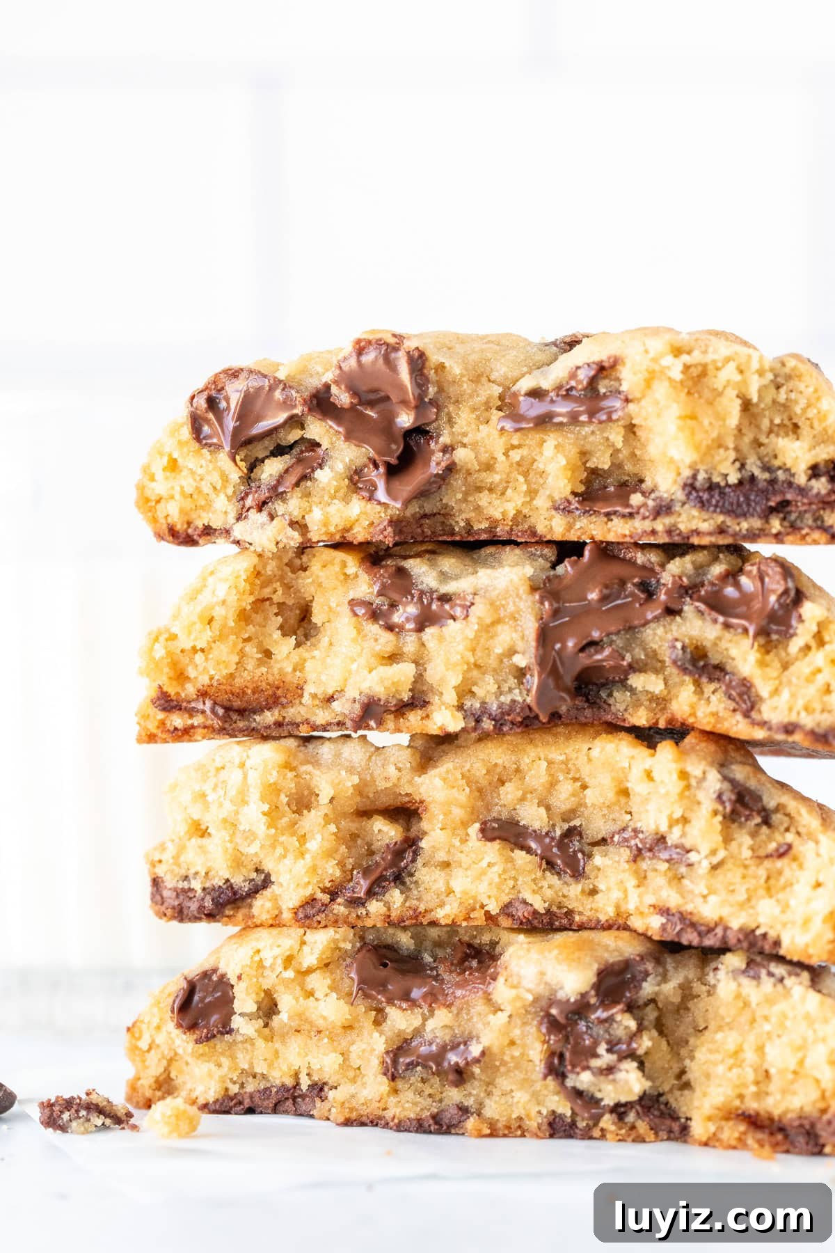 Chewy Thick Chocolate Chip Cookie Recipe for Perfect Results 2 Stack of 4 half cookies