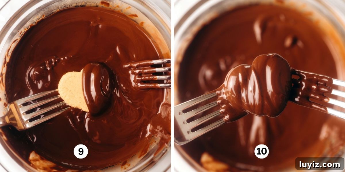 Chocolate-Covered Peanut Butter Heart Truffles 7 Dipping the chilled peanut butter hearts into melted chocolate in a glass bowl.
