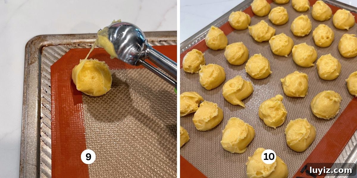 How to Make Classic Cream Puffs: Puff Pastry Filled with Vanilla Cream 9 Scooping cream puff choux pastry dough onto silicone lined cookie sheet using a one tablespoon sized cookie sccop.