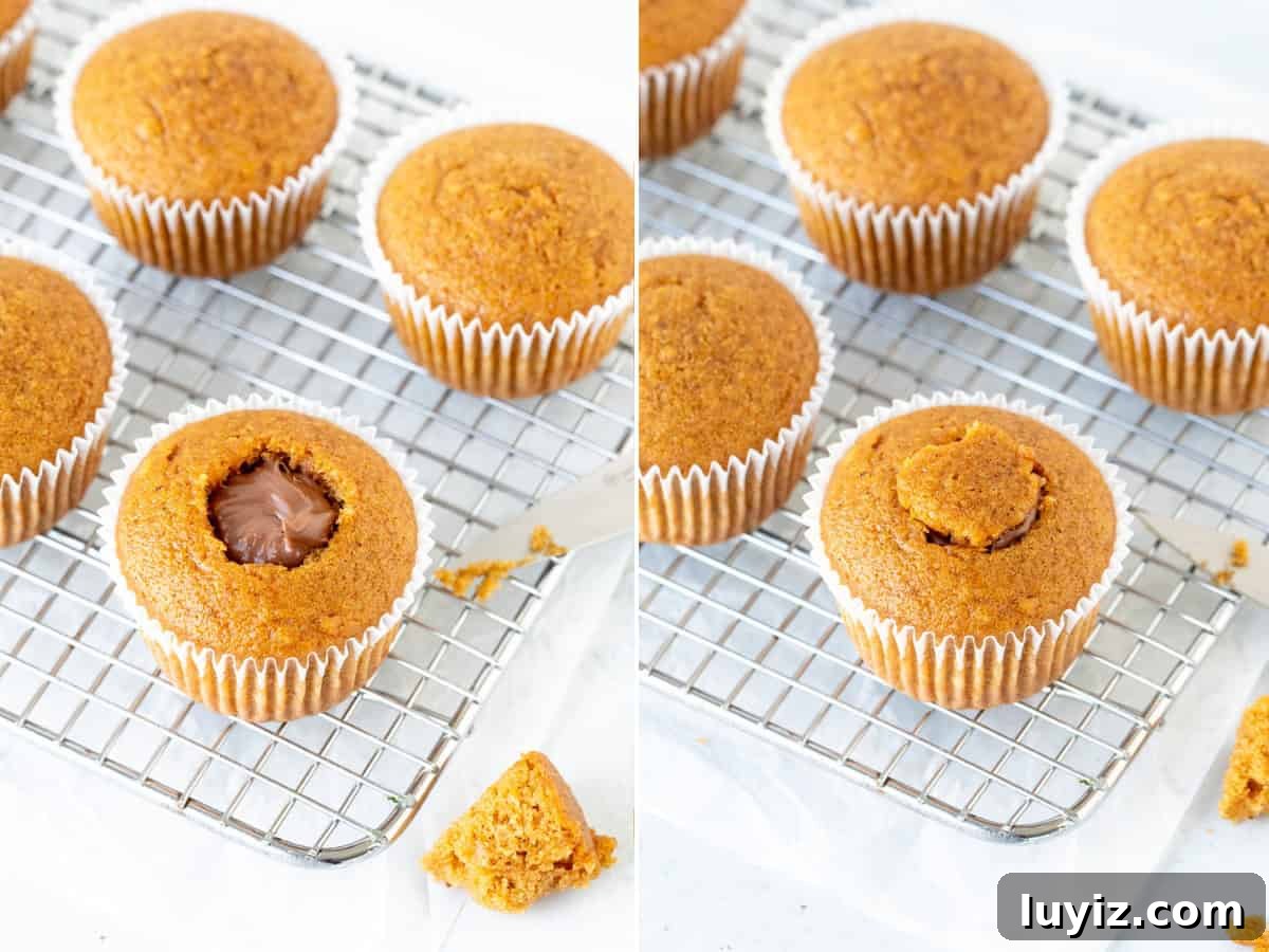 Nutella-Stuffed Pumpkin Cupcakes with Cream Cheese Frosting 4 Pumpkin cupcake being stuffed with Nutella