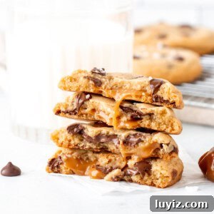 Chewy Caramel Chocolate Chip Cookies Recipe for Perfect Bakes 7 Stack of caramel chocolate chip cookies broken in half