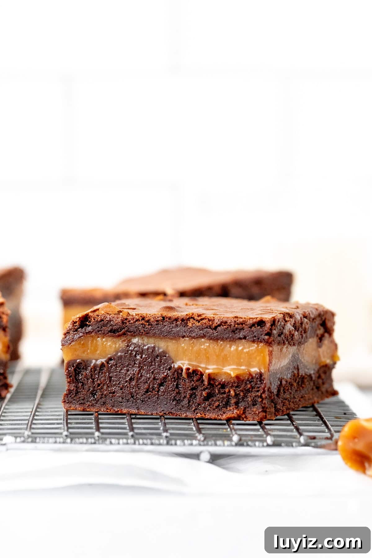 Salted Caramel Brownies with Gooey Chocolate Swirls 3 Caramel brownie on a cooling rack
