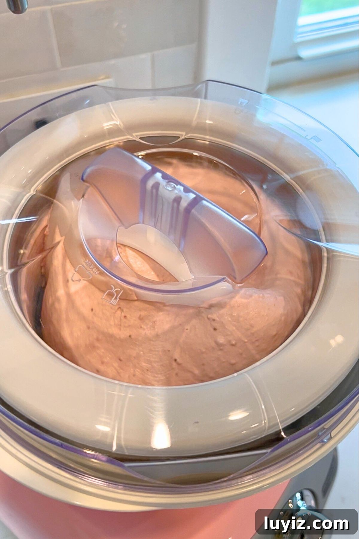 Creamy Homemade Strawberry Ice Cream Recipe You’ll Love 10 Churning the strawberry ice cream base in the Cloudy Pink Ankarsrum Assistent Original Mixer and ice cream maker attachment.