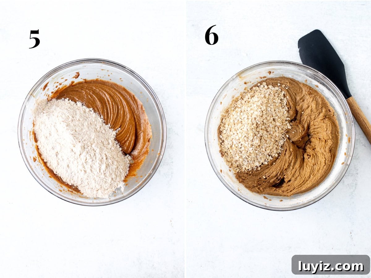 Gingerbread Oatmeal Cream Pies Recipe — Soft Spiced Sandwich Cookies 5 Bowl of dry ingredients added to bowl of butter and molasses mixture, and cookie dough with oats added into the bowl.