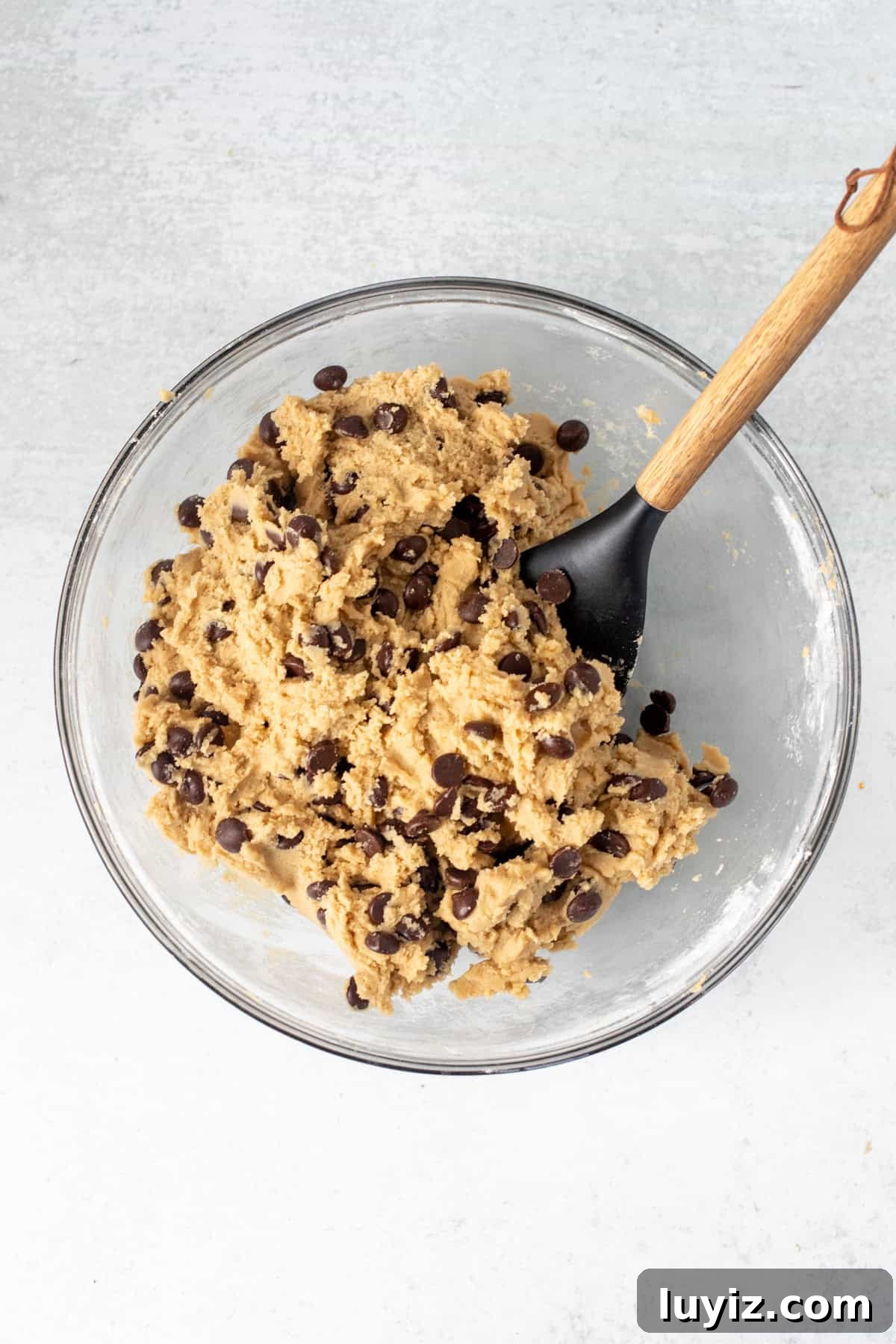 Cheesecake-Stuffed Chocolate Chip Cookies — Decadent Dessert Recipe 5 Bowl of thick chocolate chip cookie dough