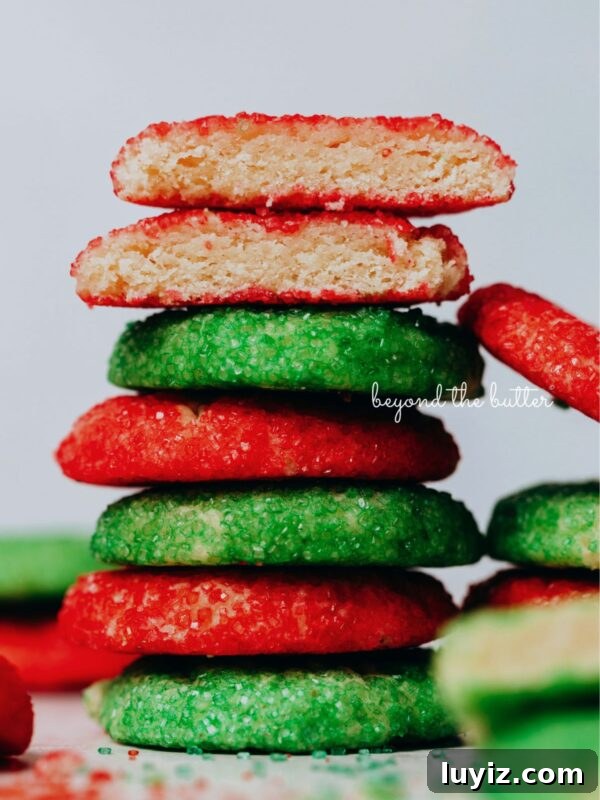 Classic Chocolate Shortbread Cookies Recipe for Homemade Treats 17 Stack of red and green sugared almond sprinkle cookies on a white background.
