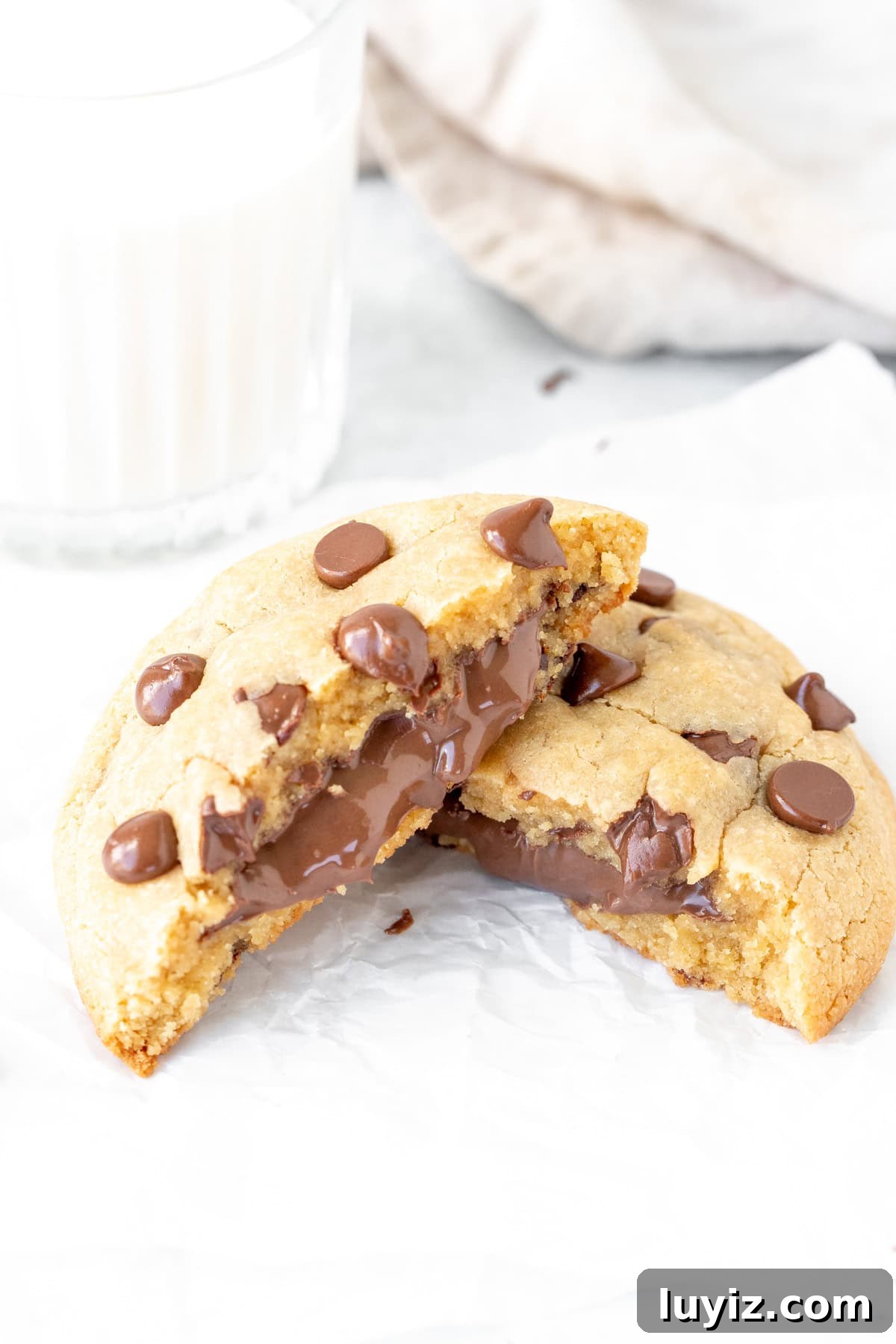 Nutella-Stuffed Single-Serve Chocolate Chip Cookie Recipe 6 Large Nutella stuffed chocolate chip cookie broken in half