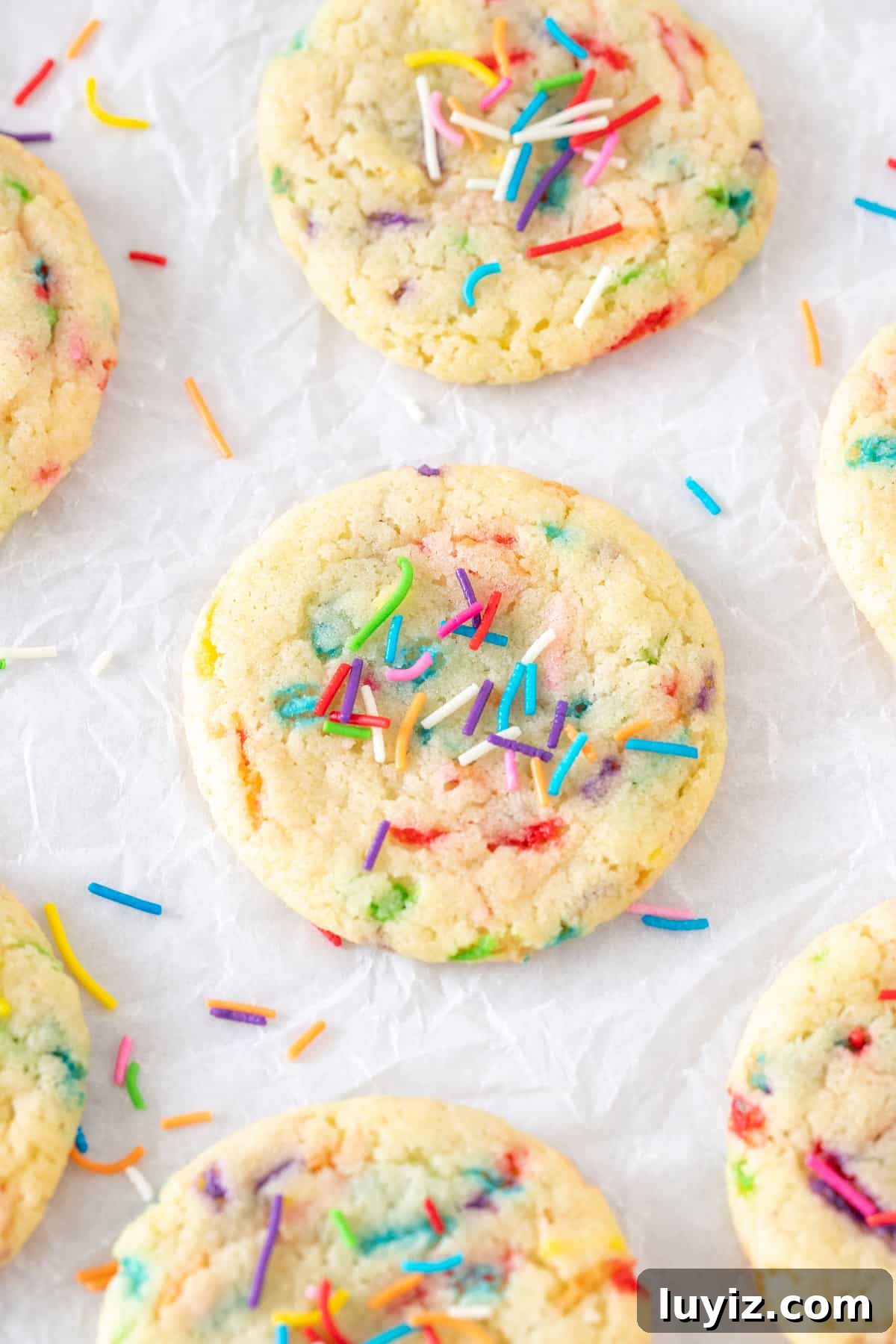 Homemade Funfetti Cookies: Soft, Chewy Recipe from Scratch 2 Funfetti cookies on baking paper