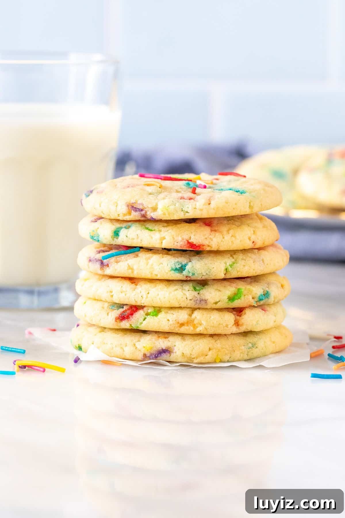 Homemade Funfetti Cookies: Soft, Chewy Recipe from Scratch 3 Stack of funfetti cookies with glass of milk