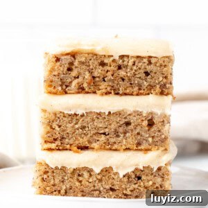 Moist Banana Bars with Cream Cheese Frosting Recipe 8 Three banana bars with cream cheese frosting, one on top of each other