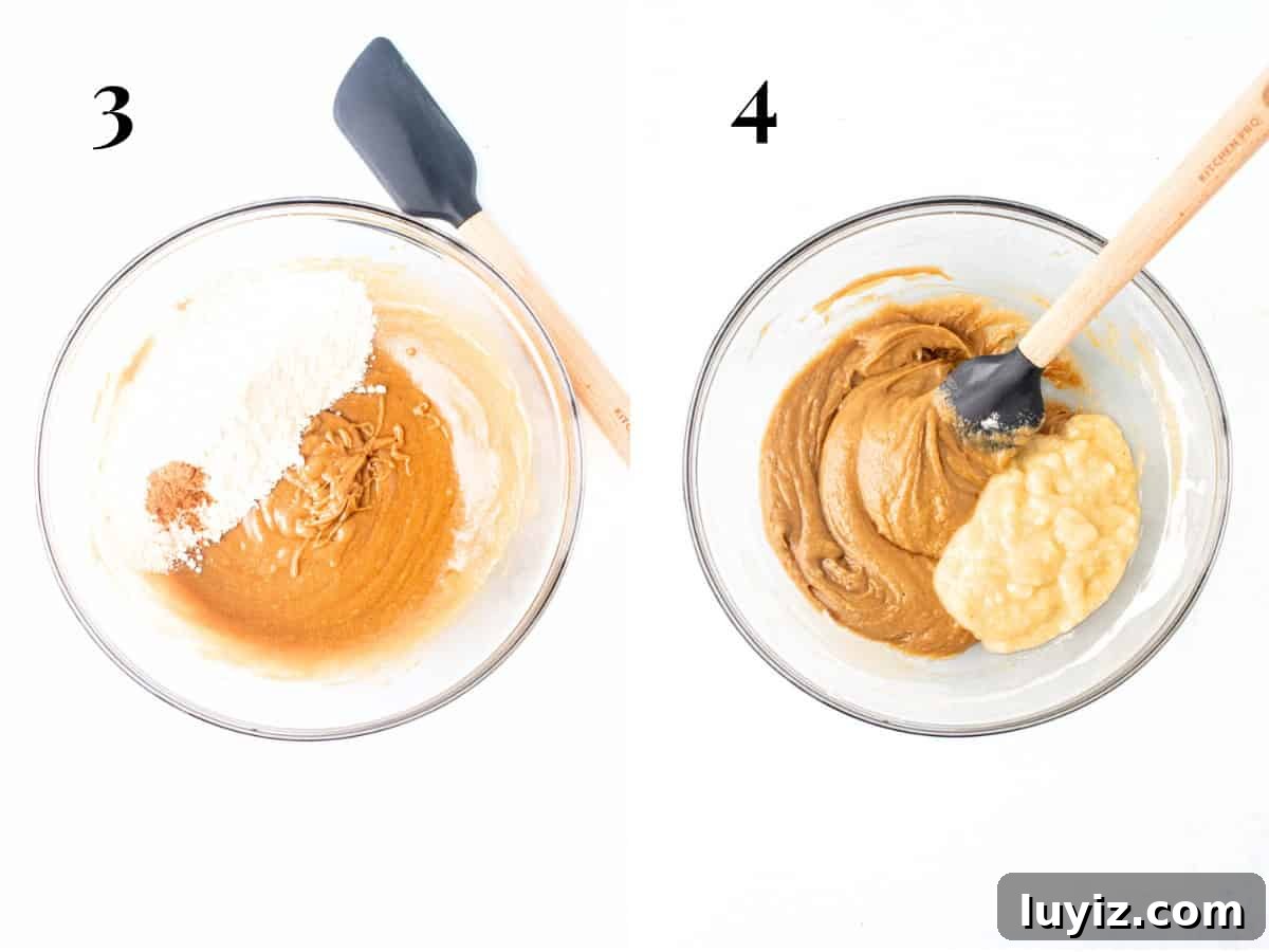 Banana Chocolate Chip Dessert Bars — Moist Baked Banana Squares 5 Bowl of batter with dry ingredients added to the bowl, and bowl of batter with mashed banana added to the bow.