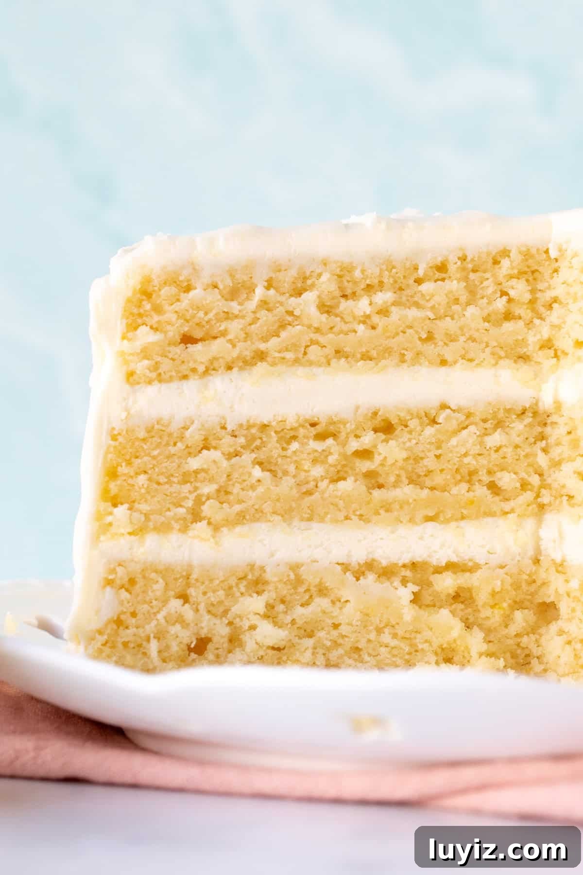 Zesty Lemon Layer Cake Recipe for Moist, Tangy Slices 7 Three layer lemon cake with lemon frosting