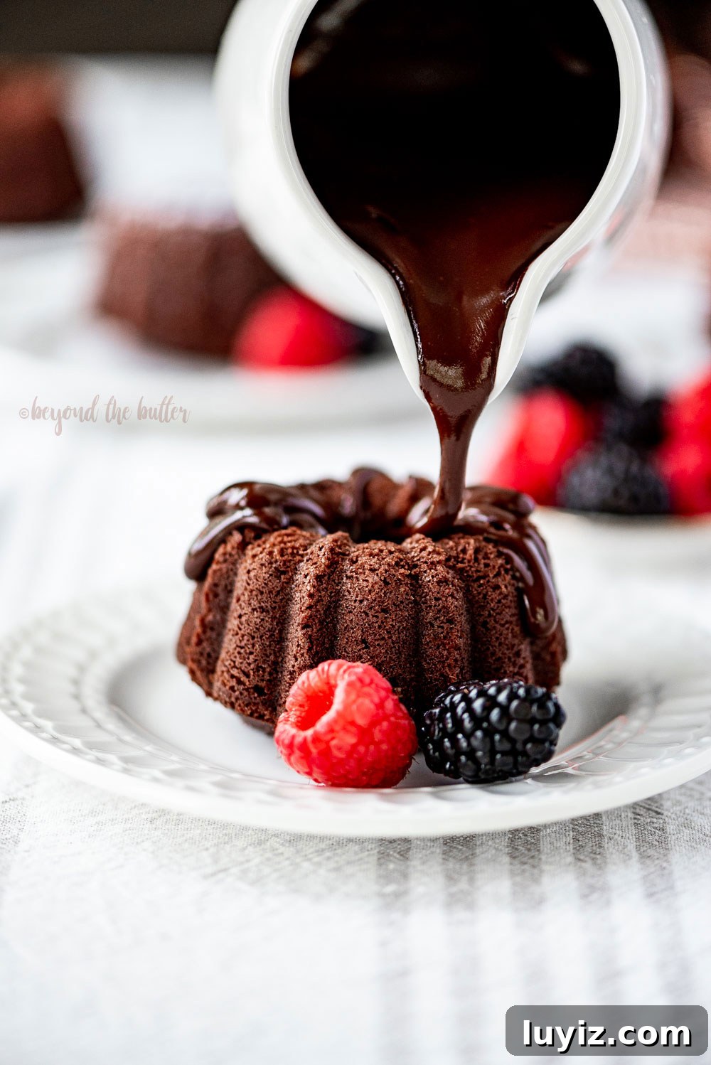 Mini Chocolate Bundt Pound Cakes — Perfect Bite-Sized Recipe 3 Mini Bundt Chocolate Pound Cakes | All Images © Beyond the Butter, LLC