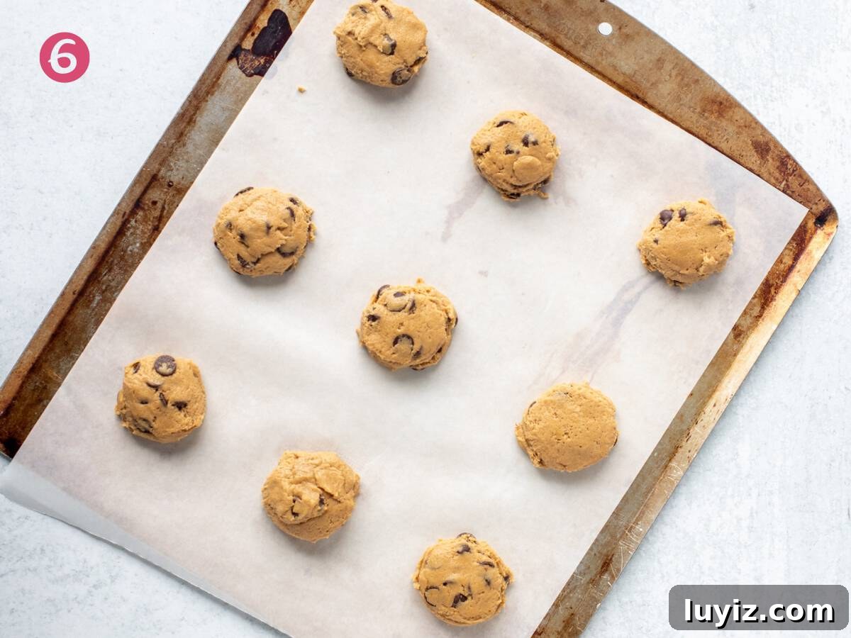 Cream Cheese Chocolate Chip Cookie Recipe for Extra Chewy Cookies 6 Cookie sheet with cookie dough balls