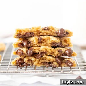Oatmeal Chocolate Chip Cookies for Two (Small Batch Recipe) 11 oatmeal chocolate chip cookies, made using a small batch recipe, broken in half and stacked on top of one another