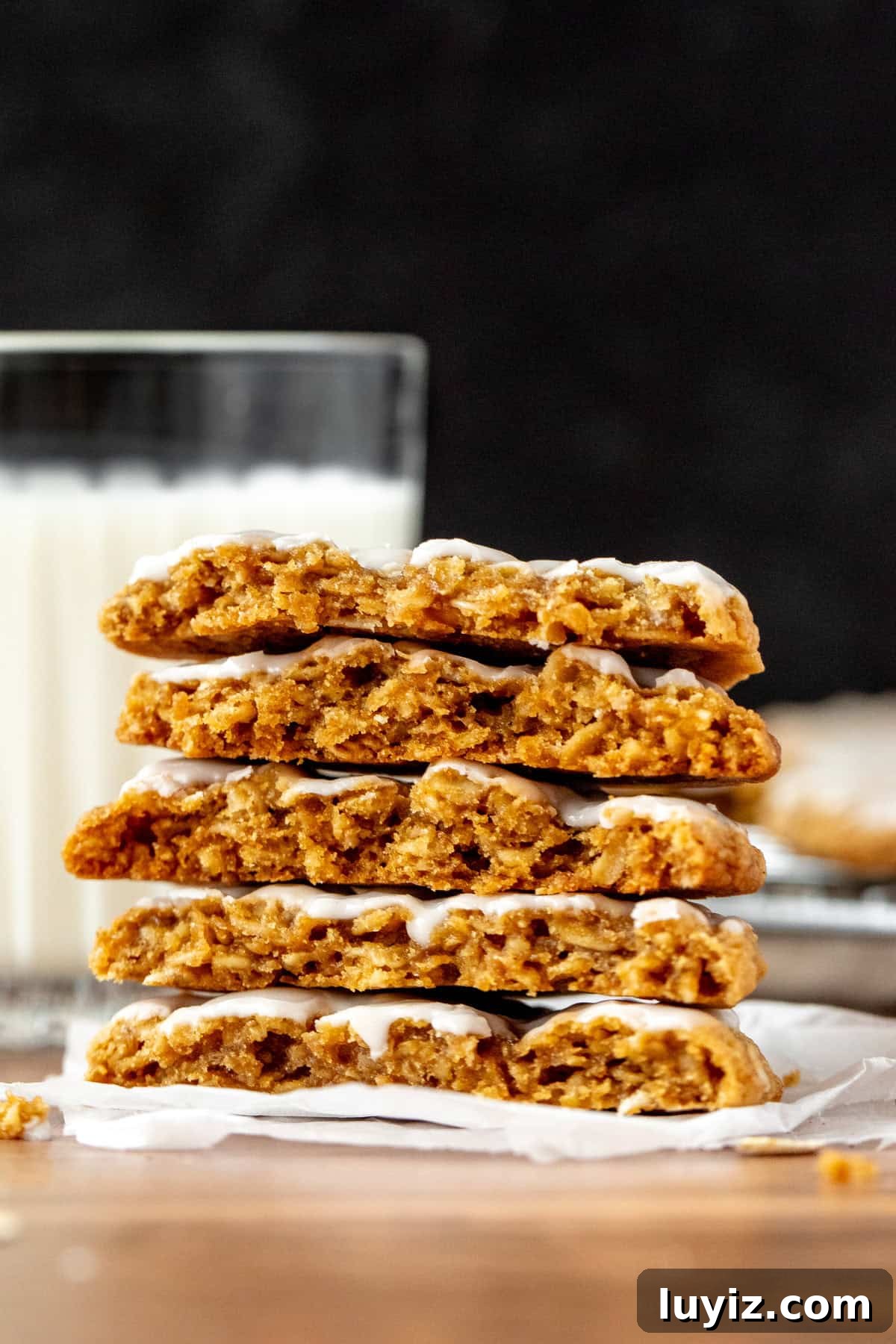 Iced Oatmeal Cookies Recipe with Soft Chewy Texture 3 Stack of iced oatmeal cookies, broken in half
