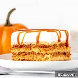 No-Bake Pumpkin Icebox Cake Recipe for Fall Desserts 7 Slice of pumpkin icebox cake made with Lotus cookies and topped with whipped cream