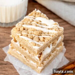 Coffee Cake Blondies Recipe — Moist Cinnamon Swirl Squares 6 Three coffee cake blondies with glass of milk