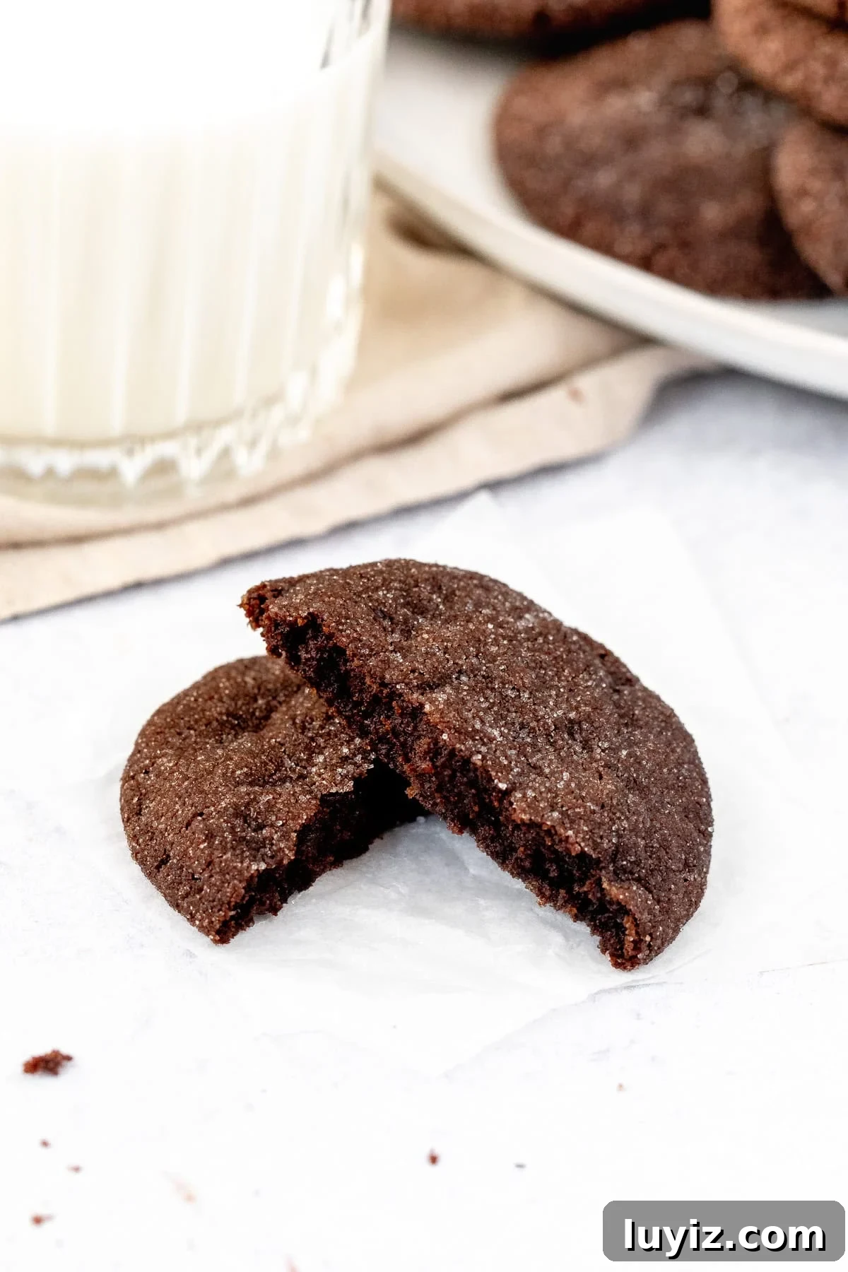 Ultimate Chocolate Sugar Cookie Recipe for Soft, Chewy Cookies 7 chocolate cookie rolled in sugar and broken in half