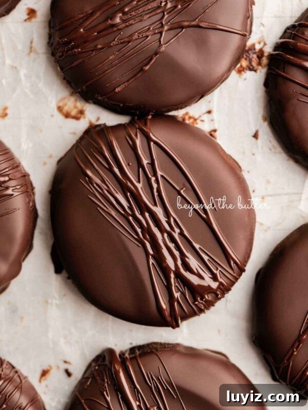 No-Bake Mint Chocolate Pie Recipe — Cool Mint Chocolate Delight 6 Chocolate dipped thin mints on a wax paper lined baking sheet.