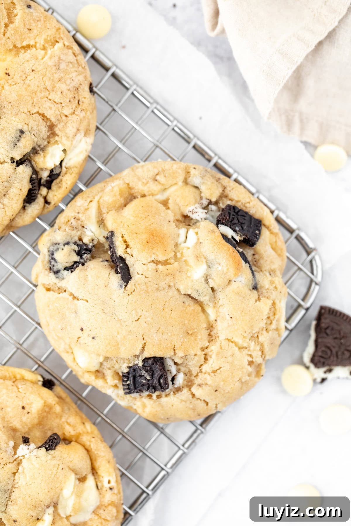 Bakery-Style Cookies & Cream Sandwich Cookies 3 Bakery style cookies and cream cookies, on a cooling rack