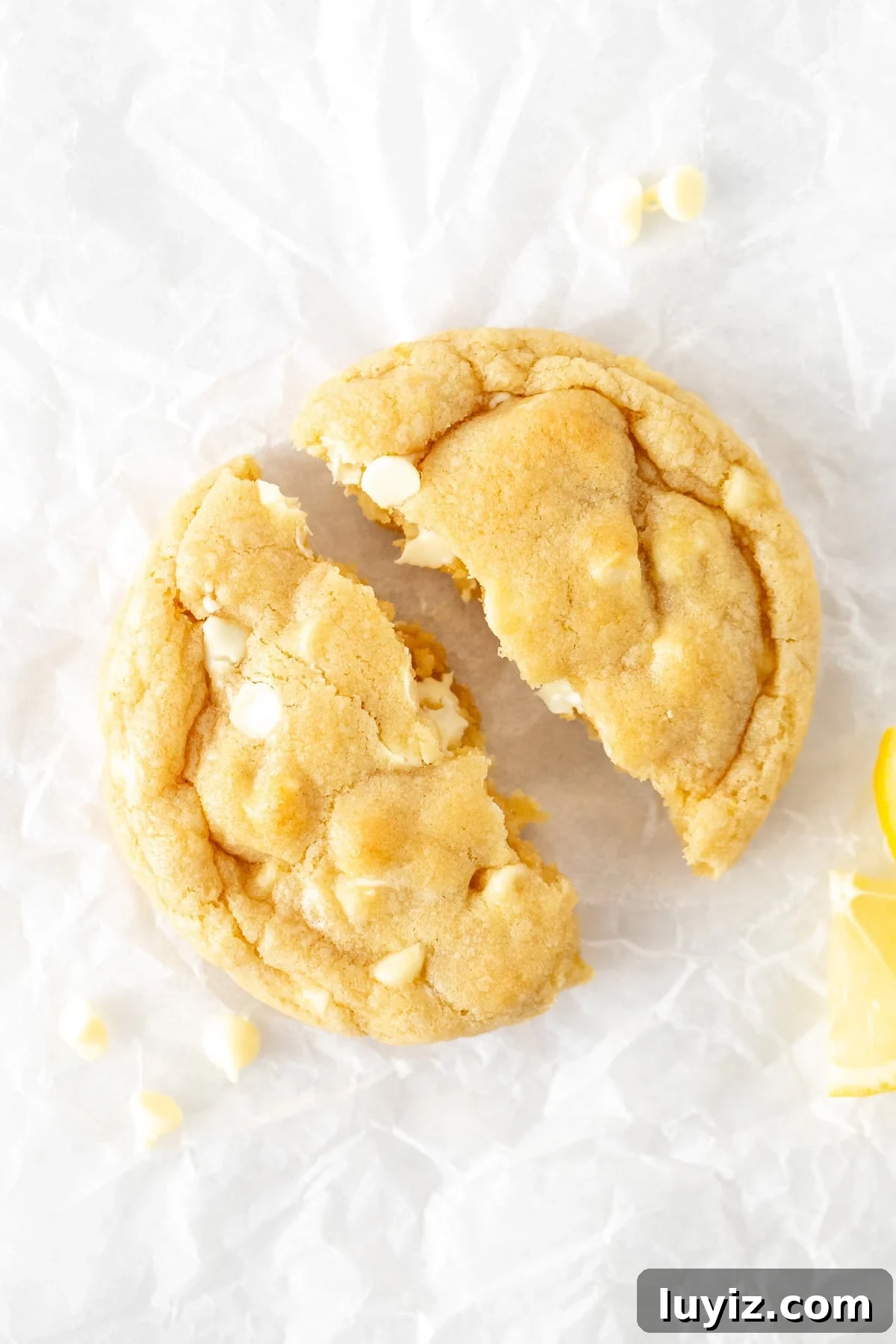 Lemon White Chocolate Chip Cookie Recipe for Tender, Zesty Bites 4 lemon white chocolate chip cookie, broken in half