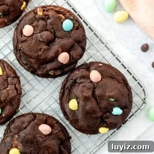 Mini egg chocolate cookies on a cooling rack
