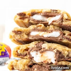 Cream Egg-Stuffed Cookies: Gooey Chocolate and Cream Filling Recipe 8 stack of cookies stuffed with Cream Eggs, broken in half
