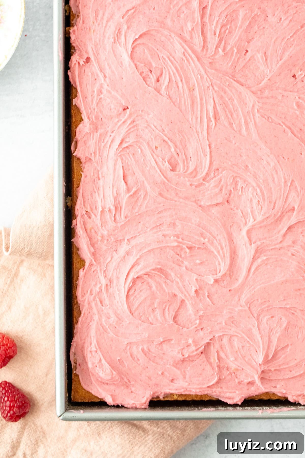 Almond Cake with Raspberry Frosting Recipe for Moist Layer Cake 3 Sheet cake with pink raspberry frosting