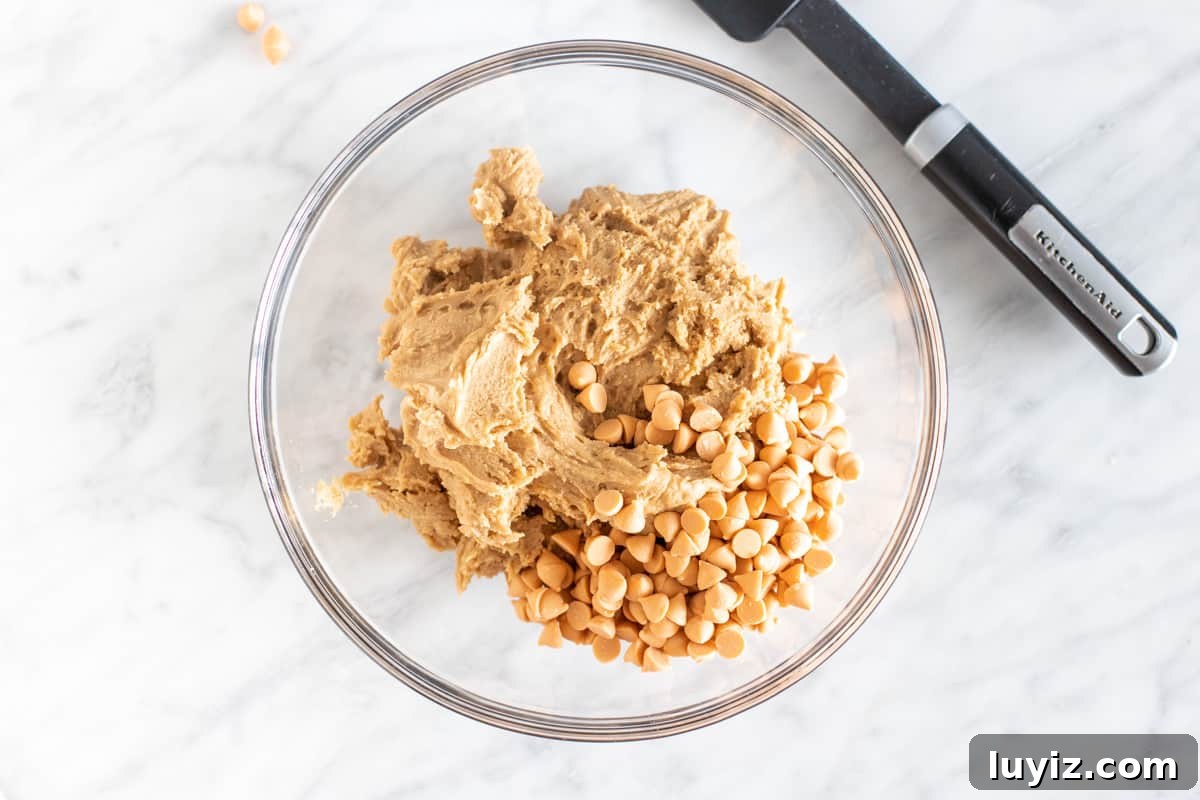Chewy Butterscotch Cookie Recipe for Perfect Home Baking 4 Bowl of cookie dough with butterscotch chips.