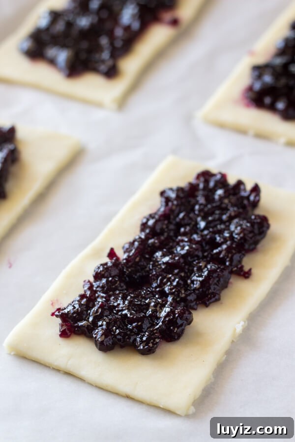 Homemade Blueberry Toaster Strudels Recipe for Flaky Breakfast 4 Butter, flaky homemade blueberry toaster strudels with juicy blueberry centers and sweet vanilla glaze. 1000 times better than the store bought variety!