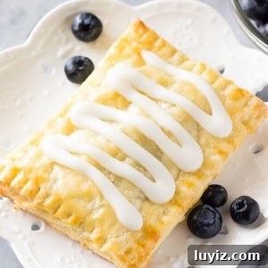 Homemade Blueberry Toaster Strudels Recipe for Flaky Breakfast 5 Butter, flaky homemade blueberry toaster strudels with juicy blueberry centers and sweet vanilla glaze. 1000 times better than the store bought variety!