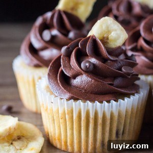 Super flavorful, perfectly moist Banana Chocolate Chip Cupcakes with Chocolate Buttercream. If you love banana bread and chocolate - these are for you!