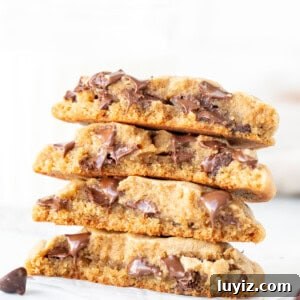 Chewy Peanut Butter Chocolate Chip Cookie Recipe 9 Stack of peanut butter chocolate chip cookies, broken in half