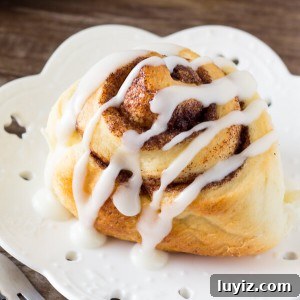 Perfectly fluffy, super soft homemade cinnamon rolls with vanilla glaze. The PERFECT cinnamon roll recipe!