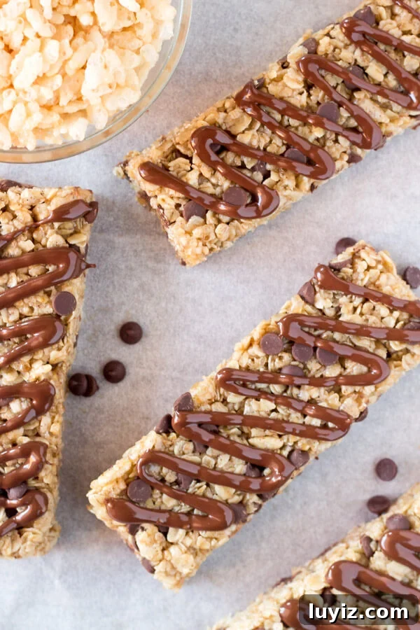 Chewy Homemade Granola Bars with Oats, Nuts & Honey 3 Soft & chewy, no bake Homemade Granola Bars with chocolate chips and chocolate drizzle. This peanut free granola bar recipe is so easy and so perfect for back to school!