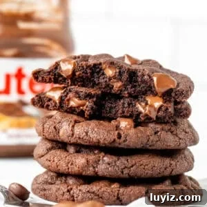 Chewy Nutella Cookies Recipe: Rich, Melt-in-Your-Mouth Treats 9 Nutella chocolate chip cookies stacked