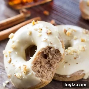 Spiced Maple Doughnuts Recipe with Warm Autumn Flavors 6 Delicious spice cake doughnuts dipped in sweet maple glaze and topped with crushed walnuts. It's like fall in maple doughnut form - and best of all, they're baked instead of fried!