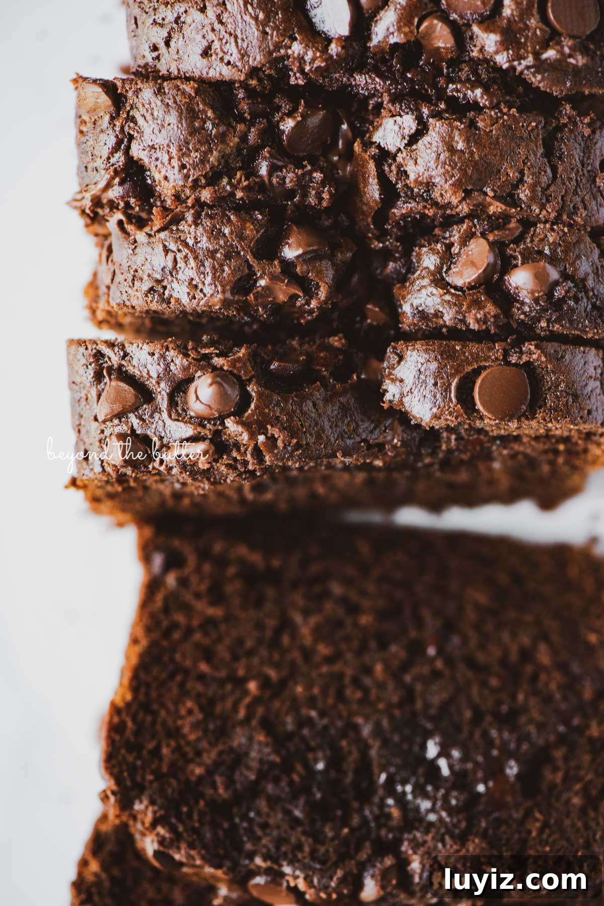 One-Bowl Chocolate Zucchini Quick Bread Recipe 2 Sliced chocolate zucchini bread | © Beyond the Butter®
