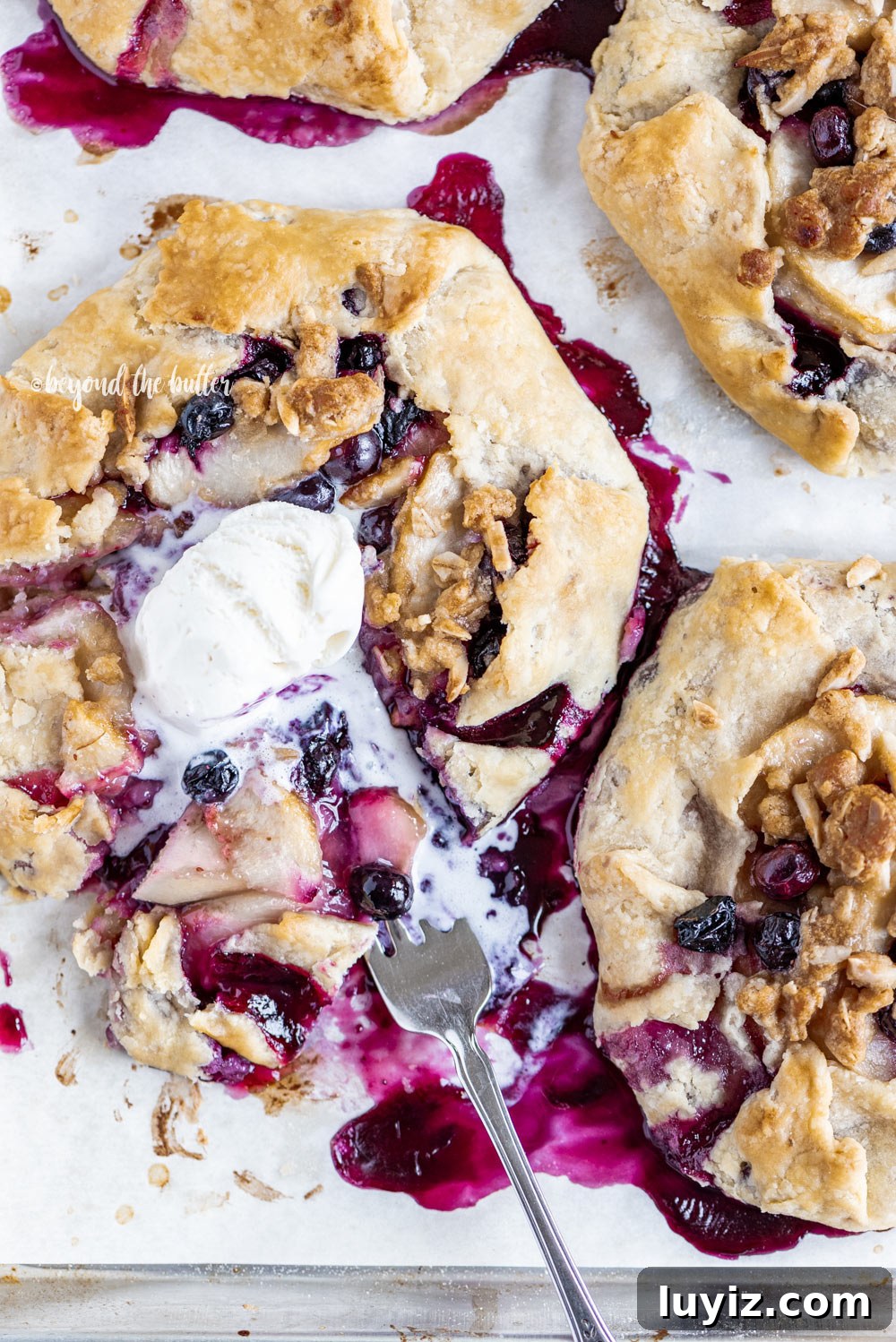 Blueberry Peach Galettes: Flaky Summer Fruit Hand Pies 4 Blueberry Peach Galettes | All Images © Beyond the Butter, LLC