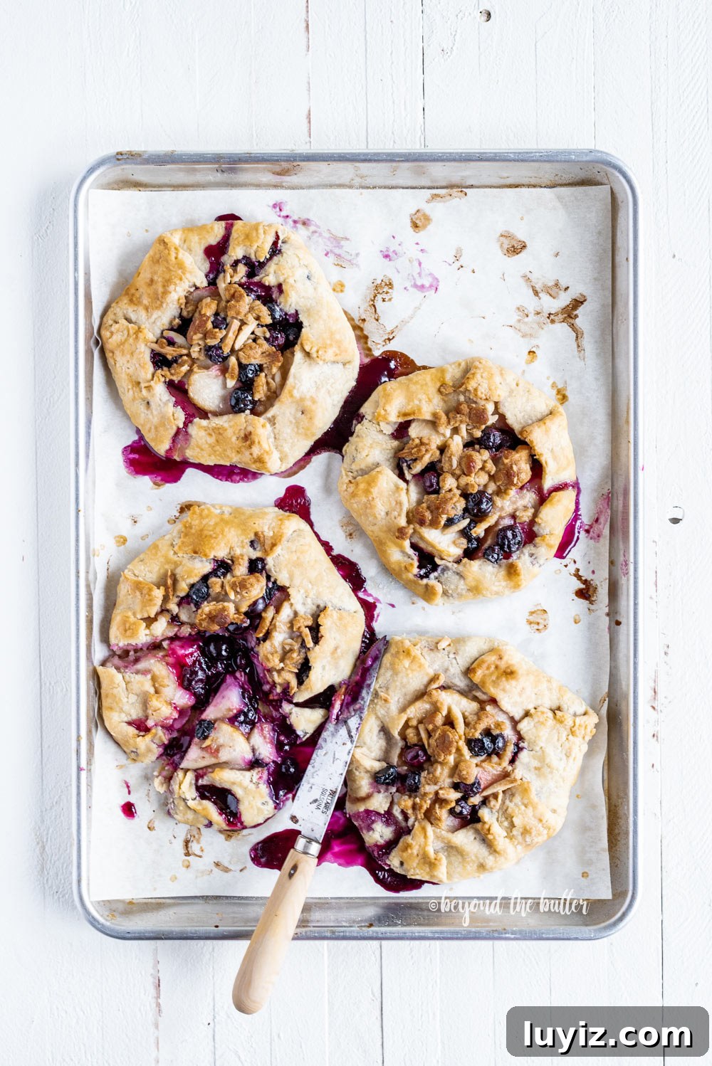 Blueberry Peach Galettes: Flaky Summer Fruit Hand Pies 5 Blueberry Peach Galettes | All Images © Beyond the Butter, LLC