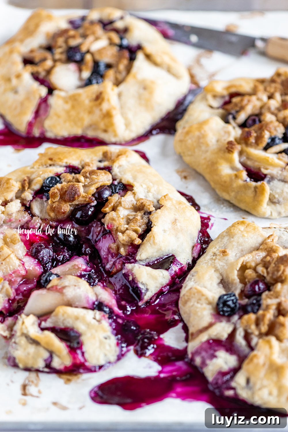 Blueberry Peach Galettes: Flaky Summer Fruit Hand Pies 6 Blueberry Peach Galettes | All Images © Beyond the Butter, LLC
