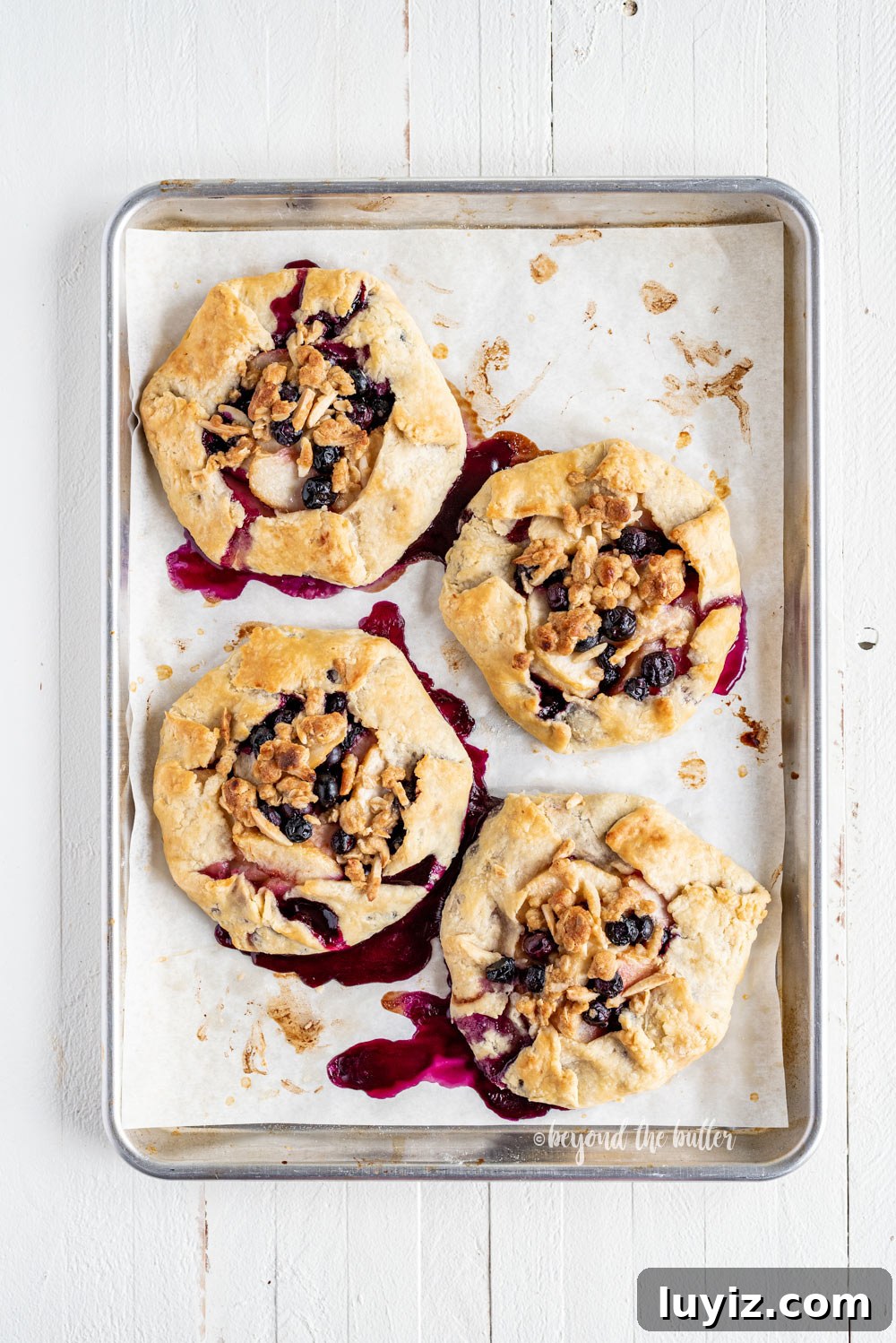 Blueberry Peach Galettes: Flaky Summer Fruit Hand Pies 7 Blueberry Peach Galettes | All Images © Beyond the Butter, LLC