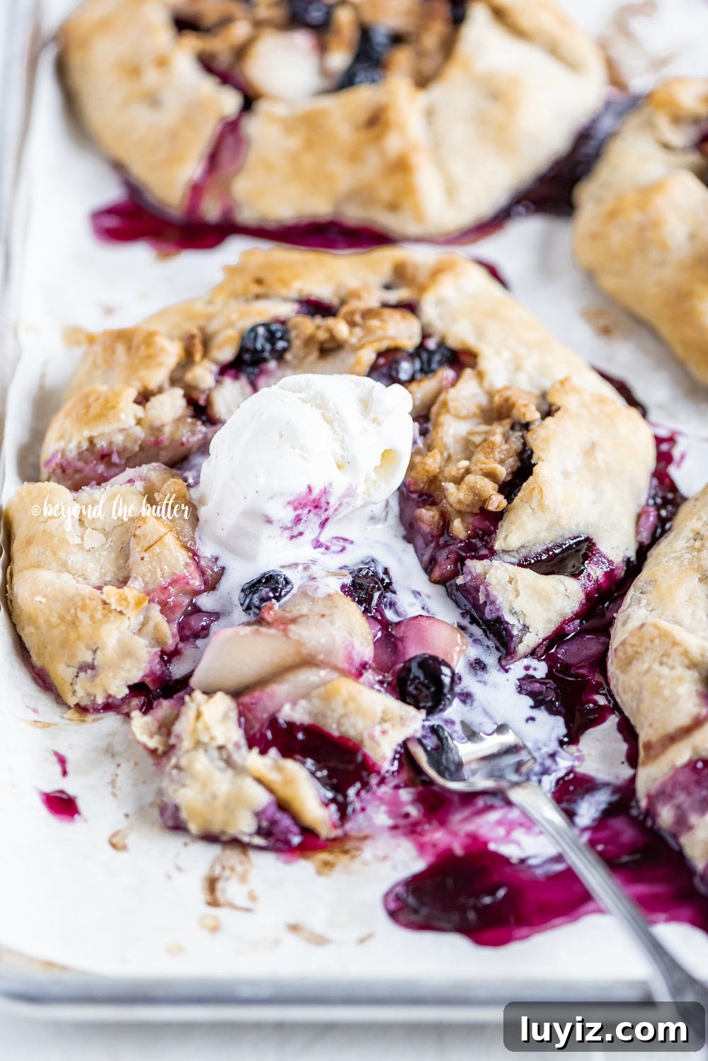 Blueberry Peach Galettes: Flaky Summer Fruit Hand Pies 9 Blueberry Peach Galettes recipe | All Images © Beyond the Butter, LLC