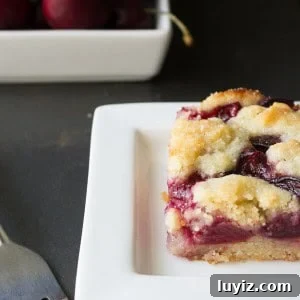 Cherry Almond Bars Recipe with Homemade Cherry Filling 5 Cherry Almond Bars - in between a pie bar & a crumb bar, this recipe for cherry almond bars have a delicious buttery almond base and are bursting with fresh cherries.