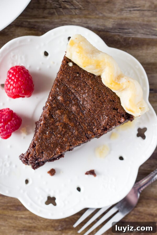 Fudge Brownie Pie Recipe — Decadent Chocolate Pie You'll Love 3 This easy, homemade Fudge Brownie Pie features a flaky, golden pie crust shell filled with the gooiest, fudgiest brownie. Serve it with ice cream & caramel sauce for the ultimate treat!