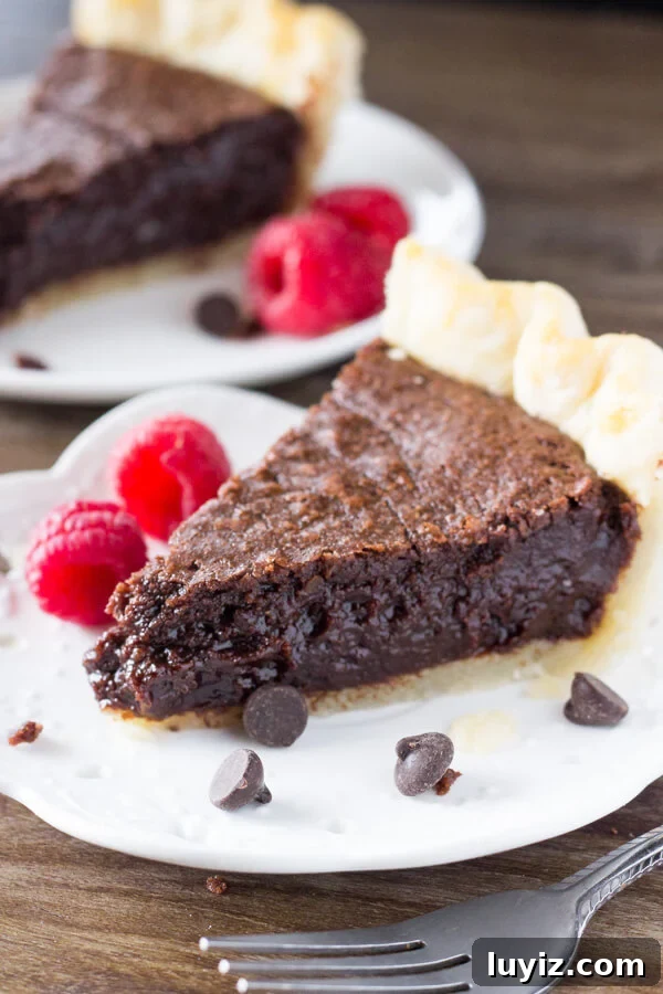 Fudge Brownie Pie Recipe — Decadent Chocolate Pie You'll Love 4 This easy, homemade Fudge Brownie Pie features a flaky, golden pie crust shell filled with the gooiest, fudgiest brownie. Serve it with ice cream & caramel sauce for the ultimate treat!