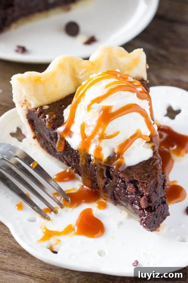 Fudge Brownie Pie Recipe — Decadent Chocolate Pie You'll Love 6 This easy, homemade Fudge Brownie Pie features a flaky, golden pie crust shell filled with the gooiest, fudgiest brownie. Serve it with ice cream & caramel sauce for the ultimate treat!