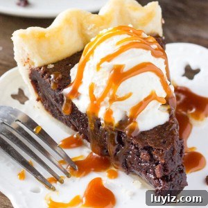 Fudge Brownie Pie Recipe — Decadent Chocolate Pie You'll Love 7 This easy, homemade Fudge Brownie Pie features a flaky, golden pie crust shell filled with the gooiest, fudgiest brownie. Serve it with ice cream & caramel sauce for the ultimate treat!