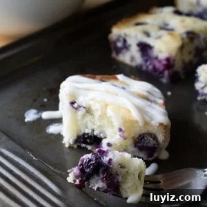 Moist Blueberry Buttermilk Cake Recipe for Perfect Summer Desserts 5 Blueberry Buttermilk Cake with Cream Cheese Glaze. Super moist & bursting with blueberries - this simple cake is perfect for summer! www.justsotasty.com